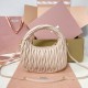 AAA Fake Miu Miu Powder Pink Wander Hobo | miumiureplica.com Replica Miu Miu Powder Pink Wander hobo bag - perfect clone with triangle logo